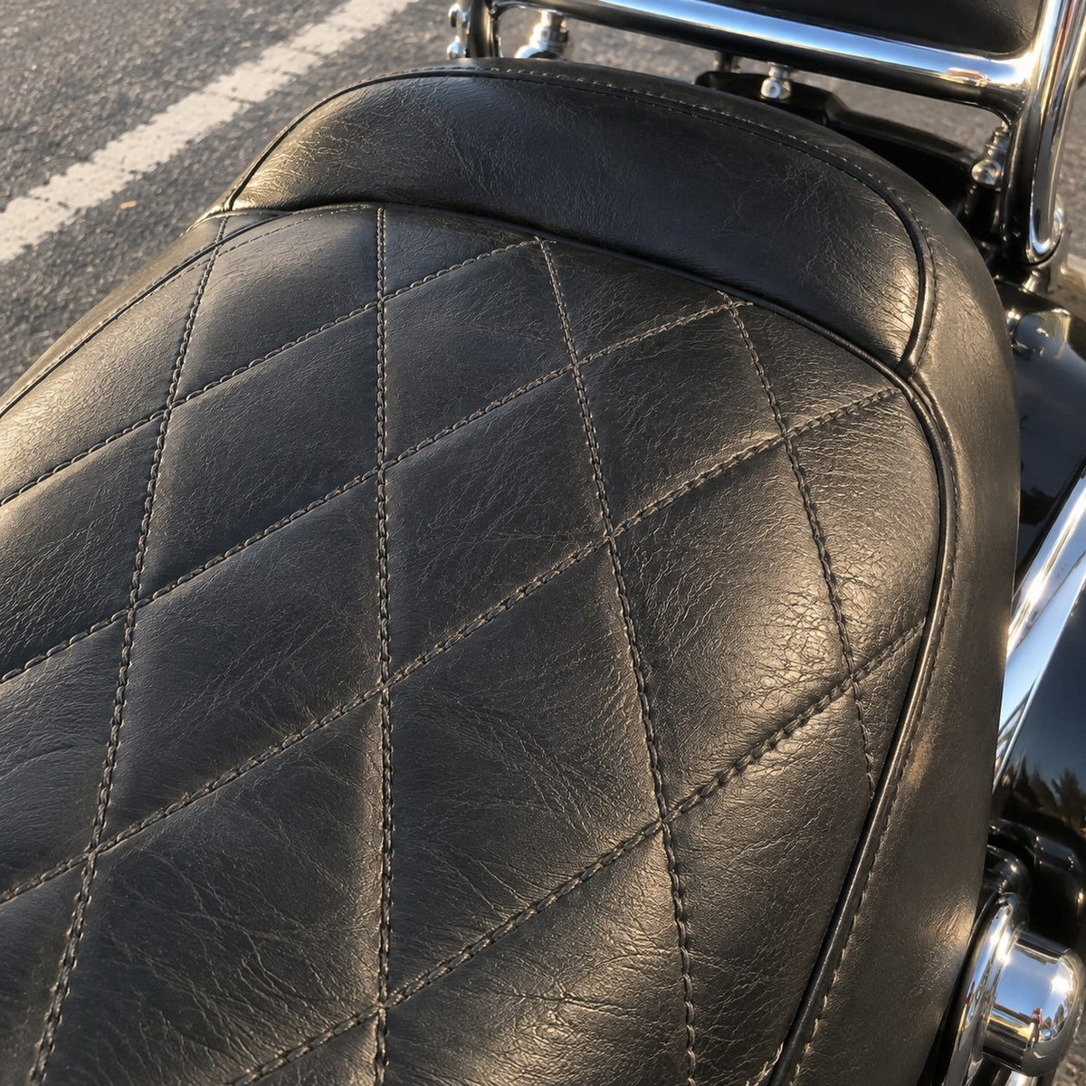 Close-up of seat stitching and grain after buffing