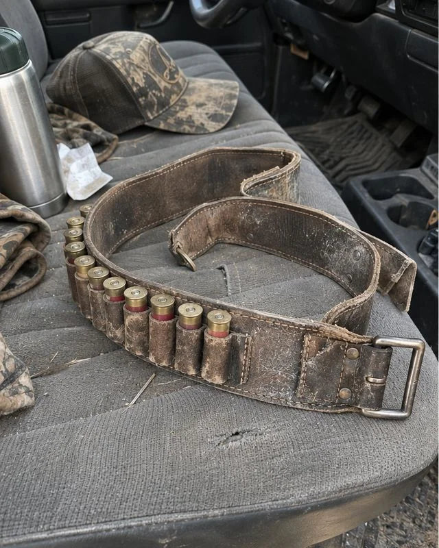 Dry, scuffed leather shell belt on a truck seat