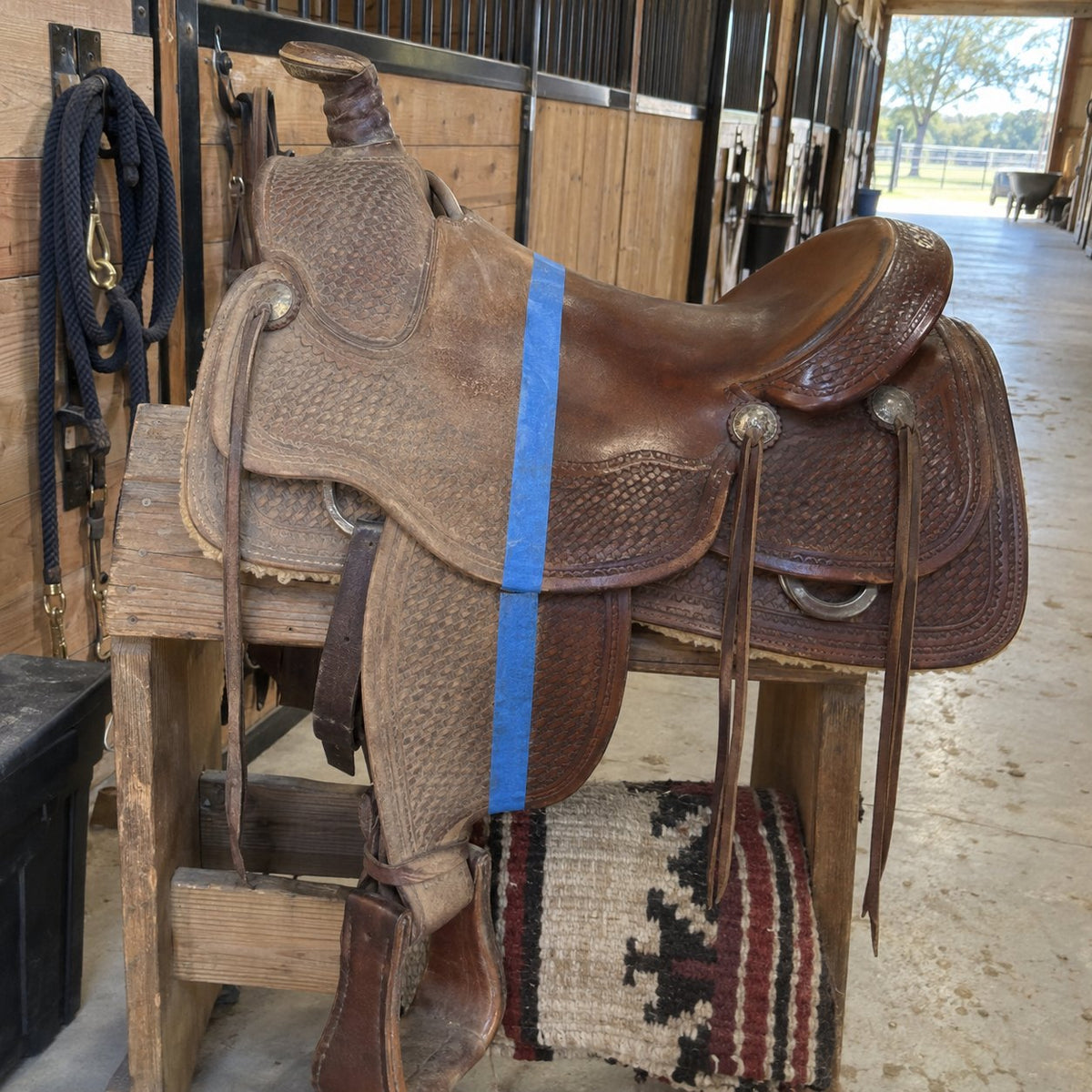 Half-done before and after on a dry Western saddle