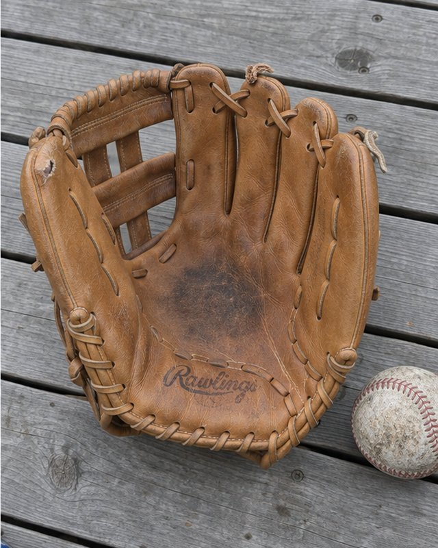 Illustration: An outfielder's H-web glove on a bench, after