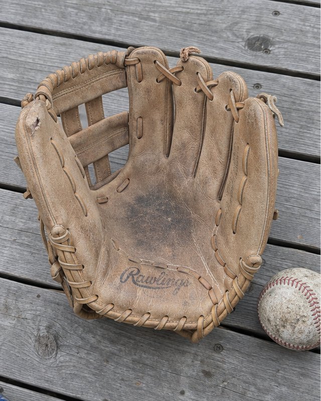 Illustration: An outfielder's H-web glove on a bench, before