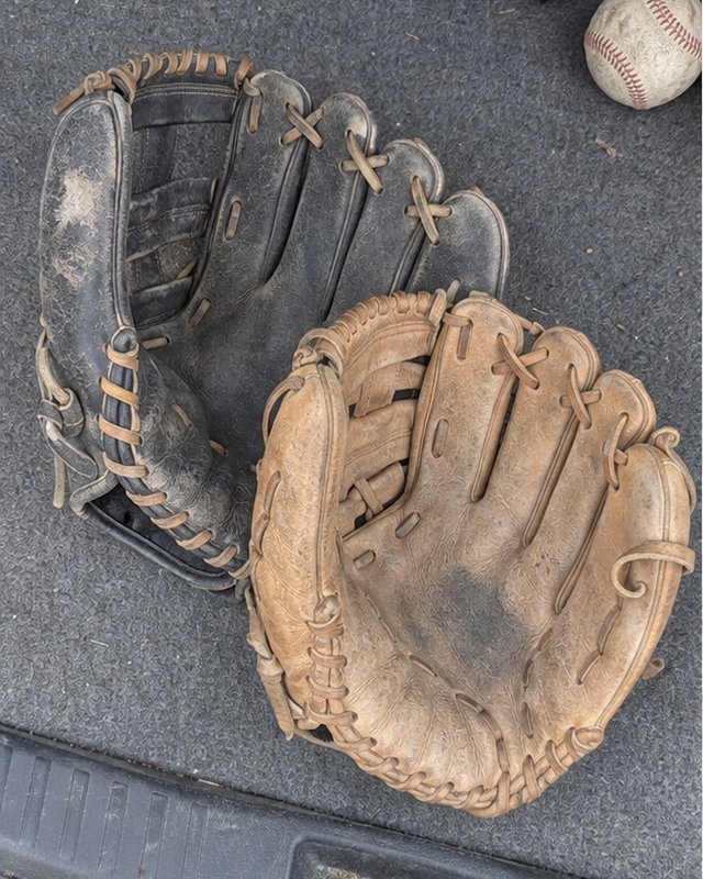 Illustration: Two gloves in the back of a car, before