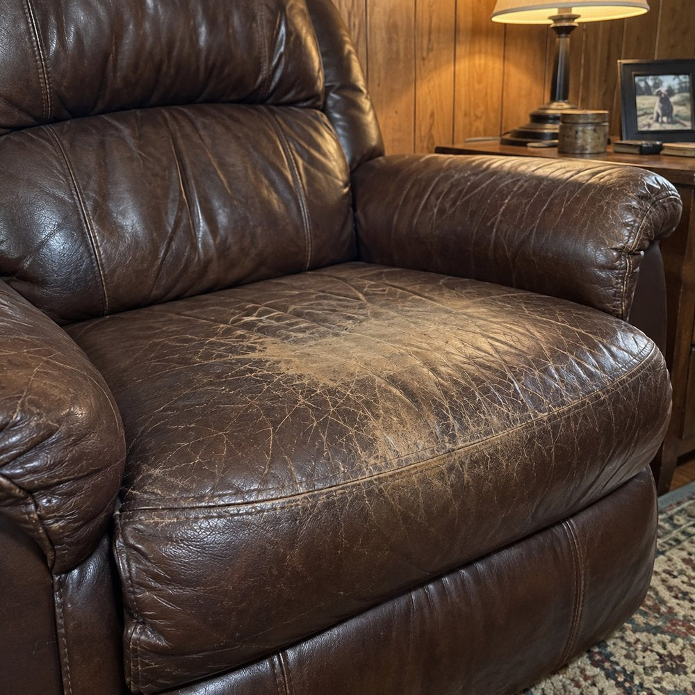Dry, creased leather on a recliner seat